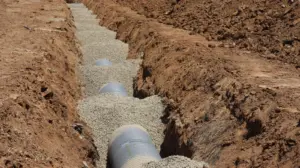Advanced Leachate Drainage Infrastructure with Ocean - Detailed view of drainage pipe construction in a trench, Elk Grove, Ca