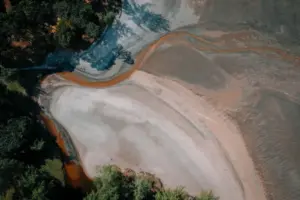 Geosynthetics on the Ganga Expressway: Soft-Ground - Stunning aerial view capturing a meandering riverbed surrounded by lush